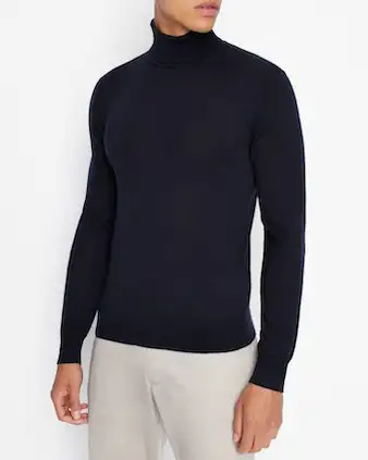 Dolcevita blu in pura lana merinos con logo ricamato sul petto